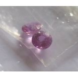 TWO SRI LANKAN ROUND CUT PINK SAPPHIRES (approx 6mm) (approx weight 2.1ct)