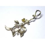 A COLLECTION OF SILVER CHARMS Leaf form with bead decoration, together with six key form charms,