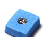 A SINGLE ROUND BRILLIANT CUT DIAMOND Complete with IGI certificate. (diamond weight 0.32ct) (Clarity