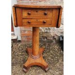 A 19TH CENTURY ROSEWOOD WORK TABLE.