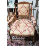 A LATE 19TH CENTURY ADAMS REVIVAL SATINWOOD AND PAINTED OPEN ARMCHAIR Decorated with facial masks