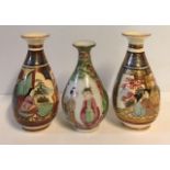 A PAIR OF 19TH CENTURY JAPANESE POTTERY MINIATURE VASES Hand painted with female figures, together