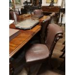 A SET OF EIGHT VICTORIAN DINING CHAIRS Brown leather upholstery.