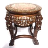 AN EARLY 20TH CENTURY CHINESE HARDWOOD AND MOTHER OF PEARL LOW TABLE With circular rouge marble