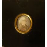 AN 18TH CENTURY MINIATURE OVAL PORTRAIT OF A GENTLEMAN On mother of pearl, in an ebonised frame. (