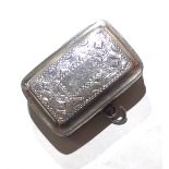 A GEORGIAN SILVER RECTANGULAR VINAIGRETTE With engraved decoration and silver pierced grille,