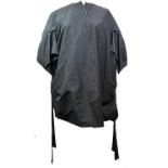 YVES SAINT LAURENT, BLACK POLYESTER COAT With large elasticated pockets alongside, short sleeves,