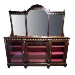 IN THE MANNER OF GILLOWS, A VICTORIAN AESTHETIC MAHOGANY MIRROR BACK BREAKFRONT BOOKCASE With box