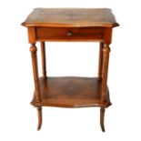 AN EARLY 20TH CENTURY FRENCH WALNUT LADIES' WORK/DRESSING TABLE The ogee shaped rise and fall top