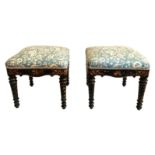 A PAIR OF VICTORIAN CHINOISERIE DECORATED FOOTSTOOLS With floral upholstered overstuffed seats, on