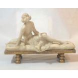 AN ART DECO PERIOD ITALIAN ALABASTER STATUE Nude female seated on a daybed, on giltwood stand. (49cm