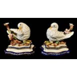 A PAIR OF SÈVRES PORCELAIN STATUES OF PREENING DOVES. (15cm)