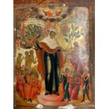 A 18TH CENTURY RUSSIAN ICON ON PANEL Hand painted with Madonna and figures on gilt ground having a