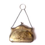 AN EDWARDIAN SILVER PURSE Of plain form with leather interior Hallmarked Birmingham 1918