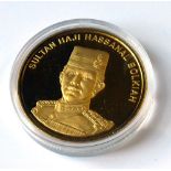 A CASED BRUNEI 24CT GOLD PROOF COMMEMORATIVE $500 COIN Limited edition issued by the Singapore