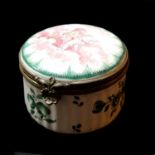 A 19TH CENTURY FRENCH FAIENCE PORCELAIN SPHERICAL PATCH BOX Hand painted with a winged cherub and