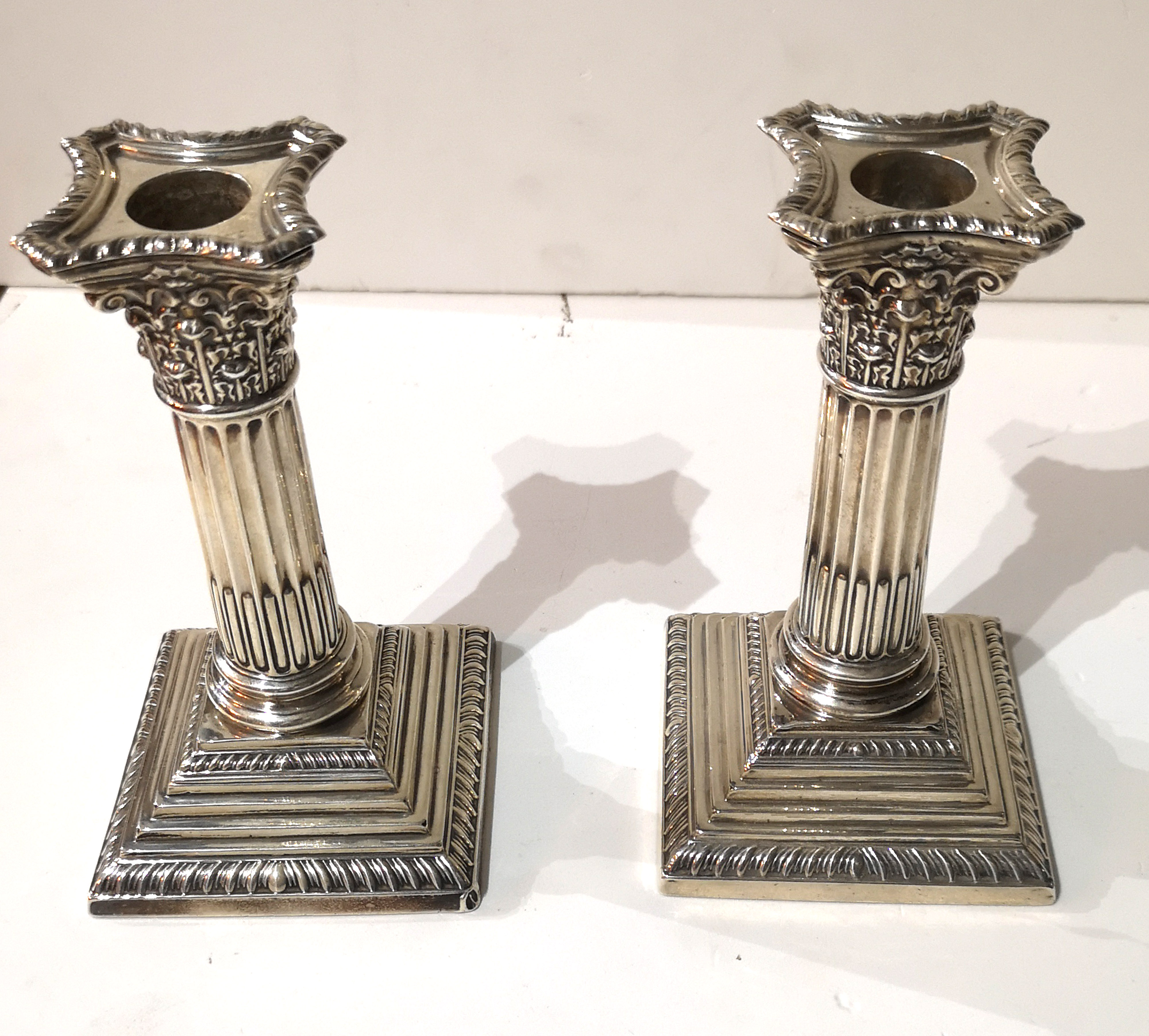 A PAIR OF EDWARDIAN SILVER CANDLESTICKS Classical column form, on a stepped square base, - Image 2 of 2