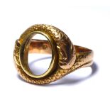 A RARE AND UNUSUAL 19TH CENTURY YELLOW METAL SNAKE RING Entwined with serpents and textured