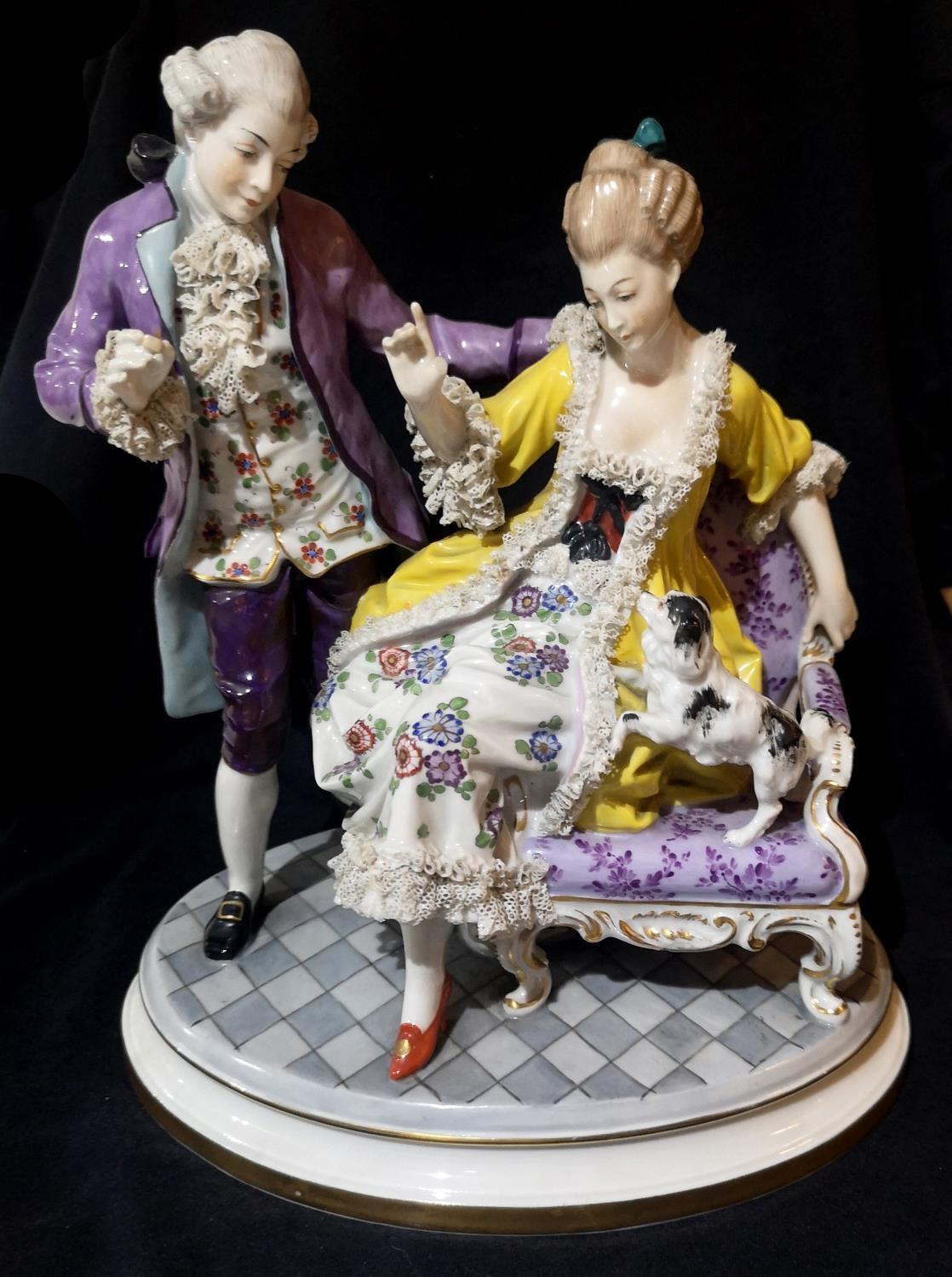 A LARGE CONTINENTAL PORCELAIN FIGURAL GROUP Courting couple in 18th Century attire, underglazed blue