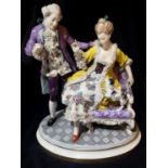 A LARGE CONTINENTAL PORCELAIN FIGURAL GROUP Courting couple in 18th Century attire, underglazed blue