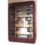 A CHINESE HARDWOOD WALL HANGING DISPLAY CABINET With mirrored back. (44cm x 67cm)