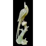 A CHINESE CARVED JADEITE BIRD SCULPTURE Exotic bird with long tail feathers. (approx 26cm)