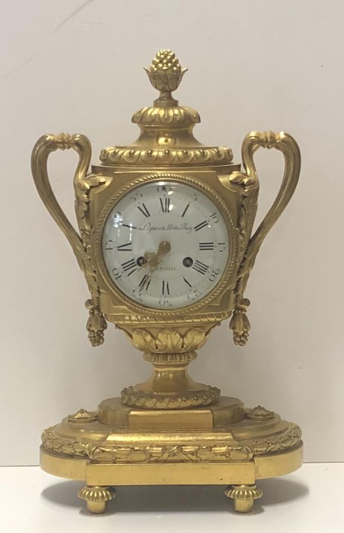 LEPAUTE LE ROY PARIS, A FINE 19TH CENTURY GILT BRONZE CLOCK In the form of a two handled trophy,