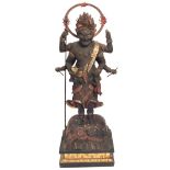 A JAPANESE EDO CARVED WOODEN AND POLYCHROME DEITY STATUE AND SHRINE Standing pose with two