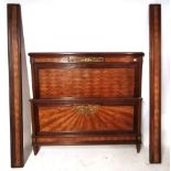 AN EARLY 20TH CENTURY FRENCH MAHOGANY AND PARQUETRY INLAID DOUBLE BEDSTEAD Applied with gilt