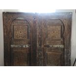 A PAIR OF 19TH CENTURY SYRIAN DOORS Islamic arch frames with painted decoration. (95cm x 192cm)