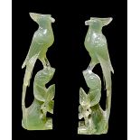 A PAIR OF CHINESE CARVED JADEITE BIRD SCULPTURES Exotic birds with long tail feathers. (approx 18cm)