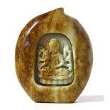 A CHINESE SOAPSTONE CARVING Of peach form featuring Guanyin within a shrine Approx 7cm x 8.5cm