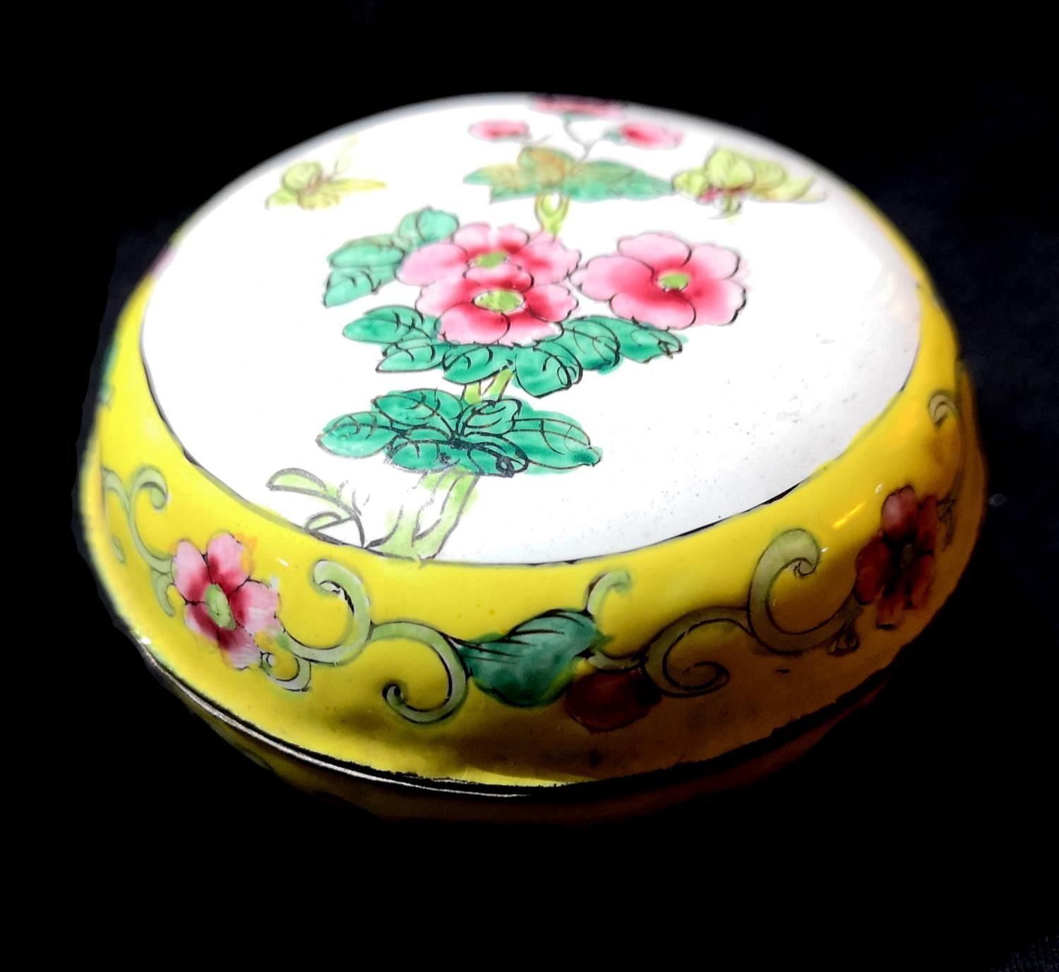 A CANTON ENAMEL ON SPHERICAL COPPER BOX Decorated with flowers and insects in yellow ground. (approx - Image 2 of 5