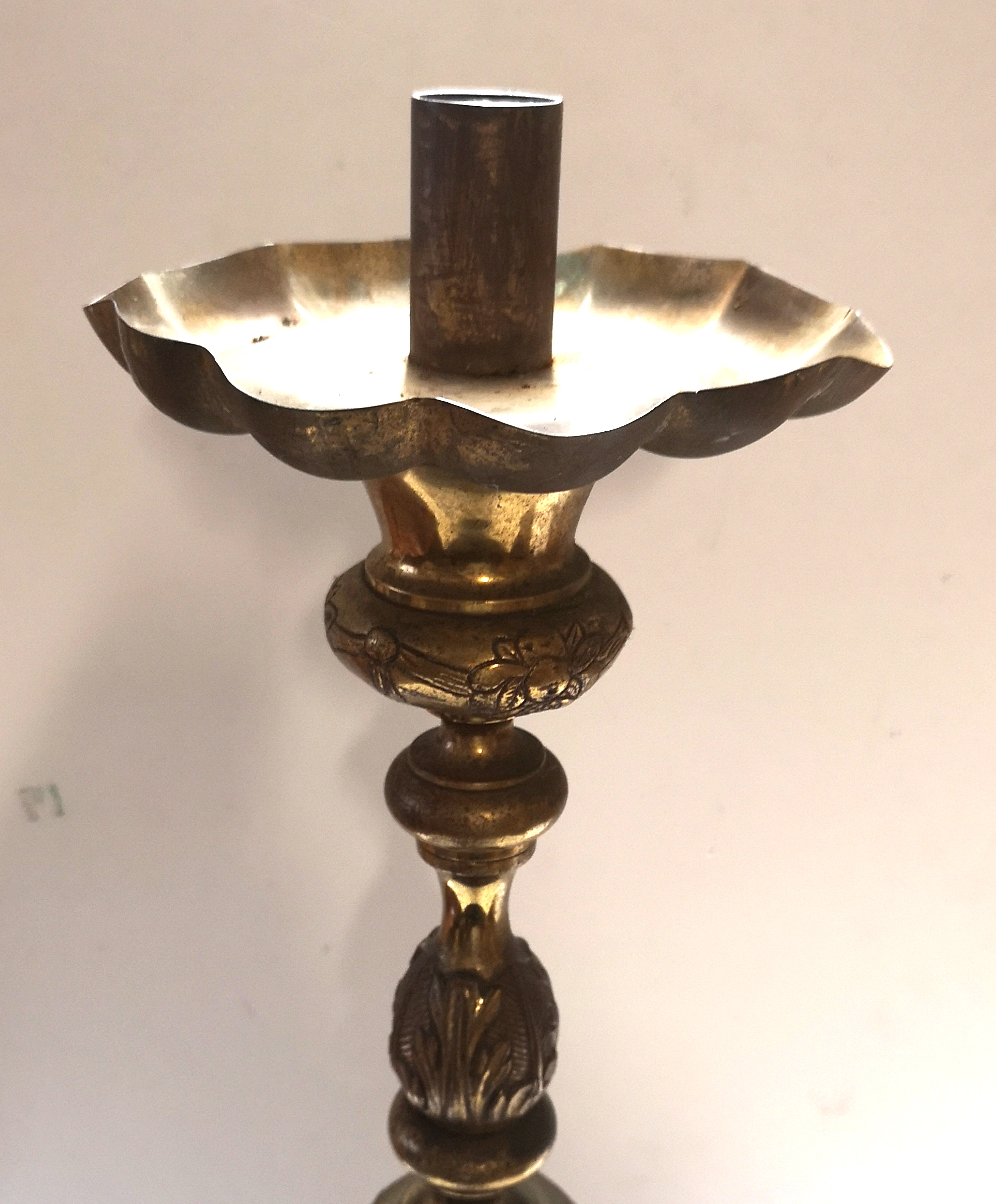 A LARGE EARLY 20TH CENTURY DUTCH PRICKET CANDLESTICK Having embossed floral decoration, on tripod - Image 2 of 2