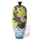 A 19TH CENTURY JAPANESE CLOISONNÉ VASE Decorated with eagle on a green ground 19 cm
