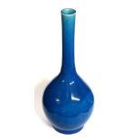 A CHINESE TURQUOISE GLAZE POTTERY BOTTLE VASE, Of plain form, unmarked. Approx 31cm