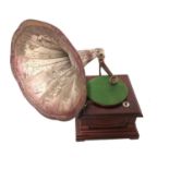 AN EARLY 20TH CENTURY SWISS MAHOGANY AND TIN PLATE GRAMOPHONE Having a large fluted trumpet on a