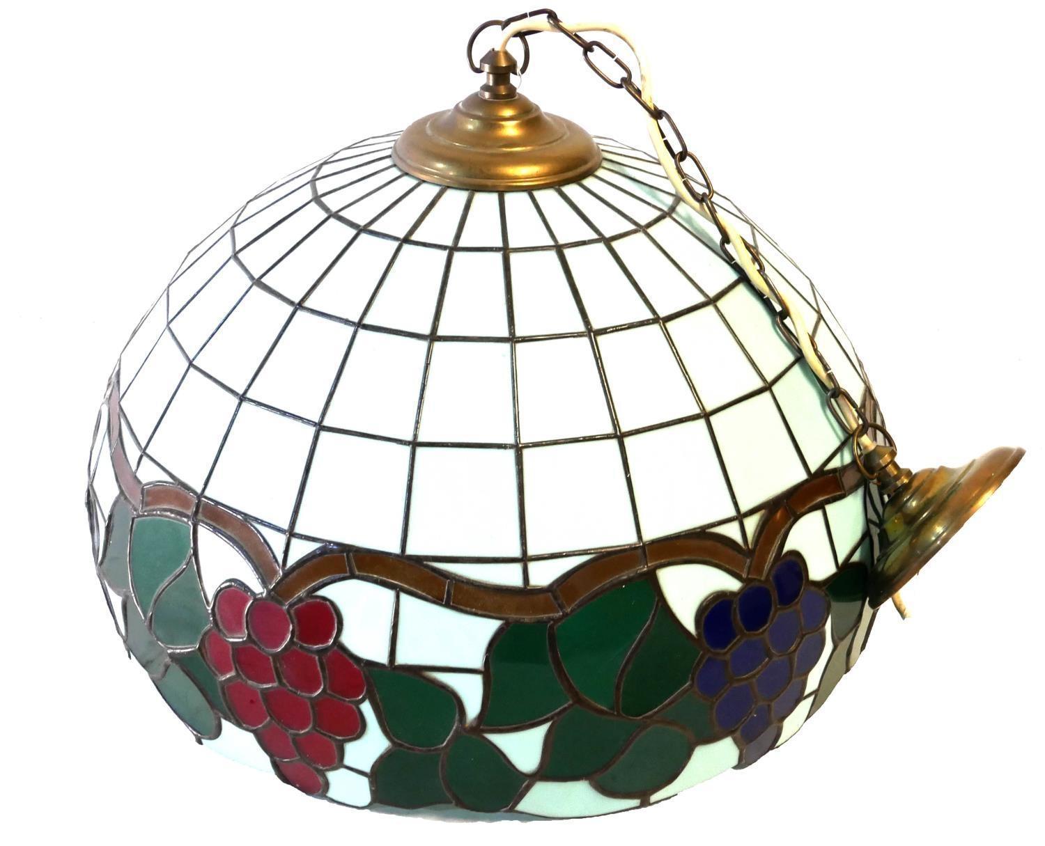 A LARGE 20TH CENTURY COLOURED LEADED GLASS LAMP SHADE Having a design of vines and grapes on light