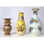 TWO MEJI PERIOD JAPANESE VASES Along with a Wedgwood lustre vase decorated with butterflies