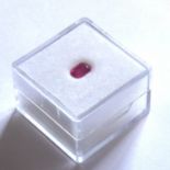 A LOOSE BAGUETTE CUT RUBY. (approx weight 0.7ct)
