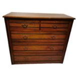 AN EDWARDIAN SATIN WALNUT CHEST With two short above three long drawers. (96cm x 47cm x 102cm)