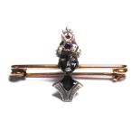 A BI METAL, ENAMEL, AMETHYST AND CORAL VENETIAN BLACKAMOOR STICK PIN A black enamel female bust with