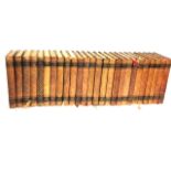 A COLLECTION OF SIXTY EARLY 20TH CENTURY DANISH LEATHER BOUND BOOKS Including a set of twenty-six