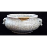 A LATE 18TH/ EARLY 19th CENTURY CHINESE CELADON CRACKLE GLAZE CENSOR Having twin handles and gilt