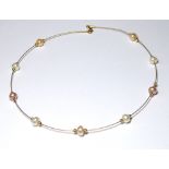 A 14CT GOLD AND MOTHER OF PEARL NECKLACE Five link chain with spherical beads, in a fitted velvet