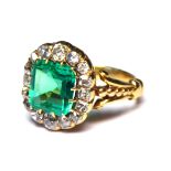 A YELLOW METAL (TESTS AS 18CT) AND 19TH CENTURY NATURAL COLUMBIAN EMERALD AND DIAMOND RING The