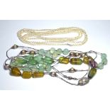 A SILVER, GEM STONE AND PEARL SET NECKLACE Light green stones, together with a rice pearl