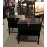 A PAIR OF EBONISED BEDSIDE CABINETS With diamanté handles, single drawers above open shelves. (