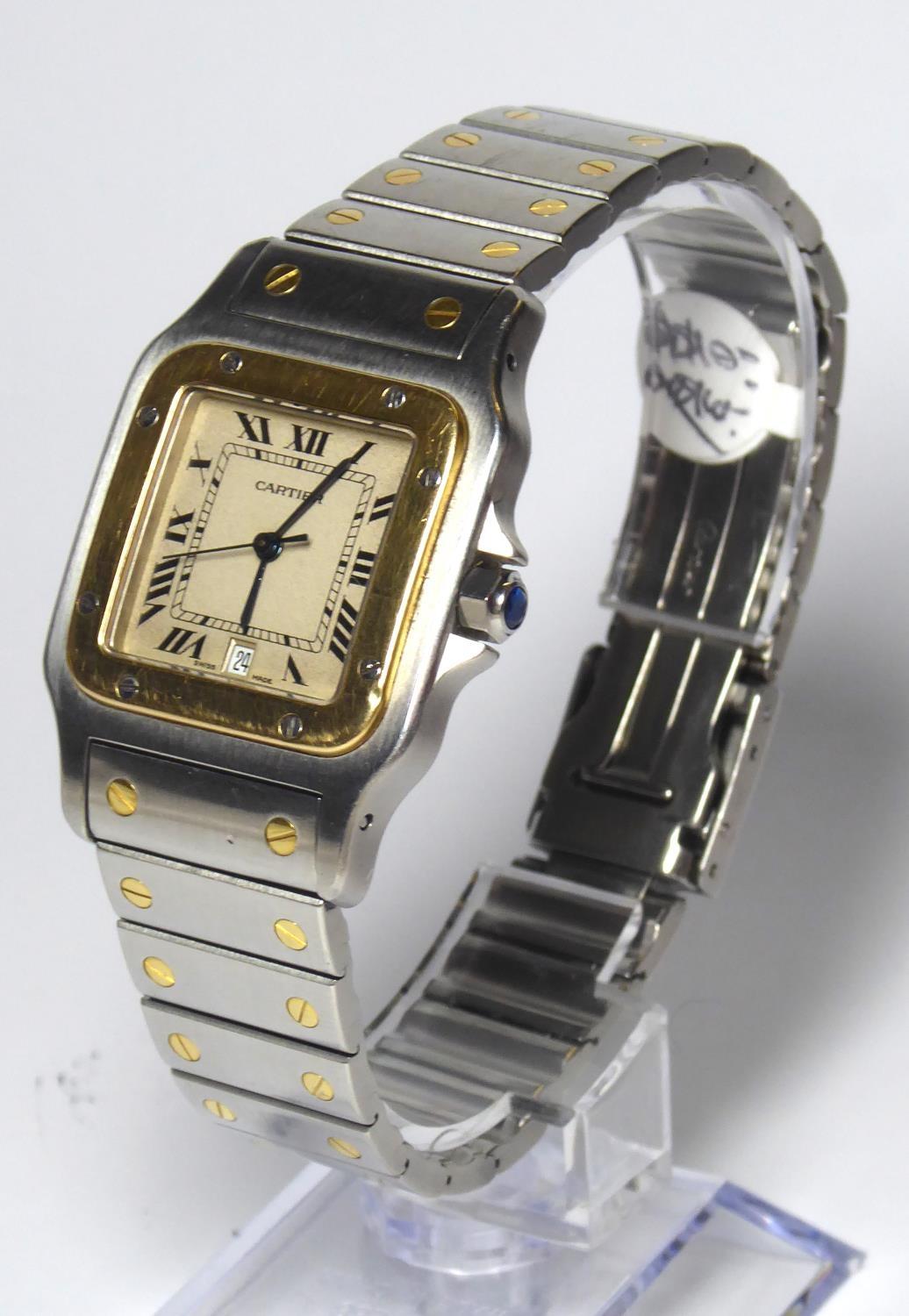 CARTIER, SANTOS, A GENTLEMAN'S TWO TONE BRACELET WATCH Boxed.