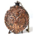 A 19TH CENTURY PRUSSIAN COPPER POWDER MONKEY With two headed imperial eagle and facial masks 11 cm